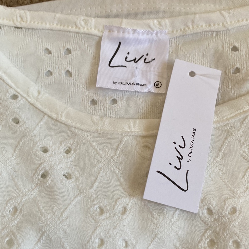 NEW W/ TAGS. Cute eyelet dress/attached liner. Flutter sleeves/ruffle hem. Med - Picture 3 of 6